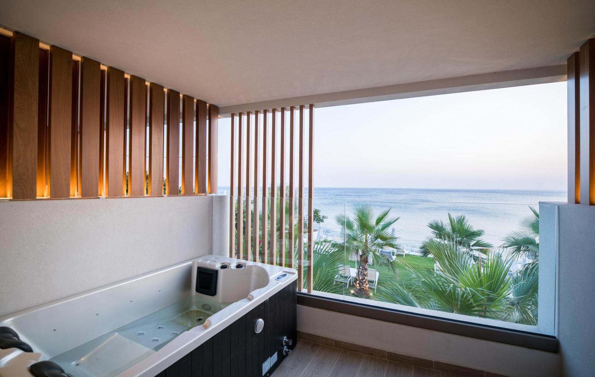 Dazzling Blue Sea View Outdoor Hot Tub